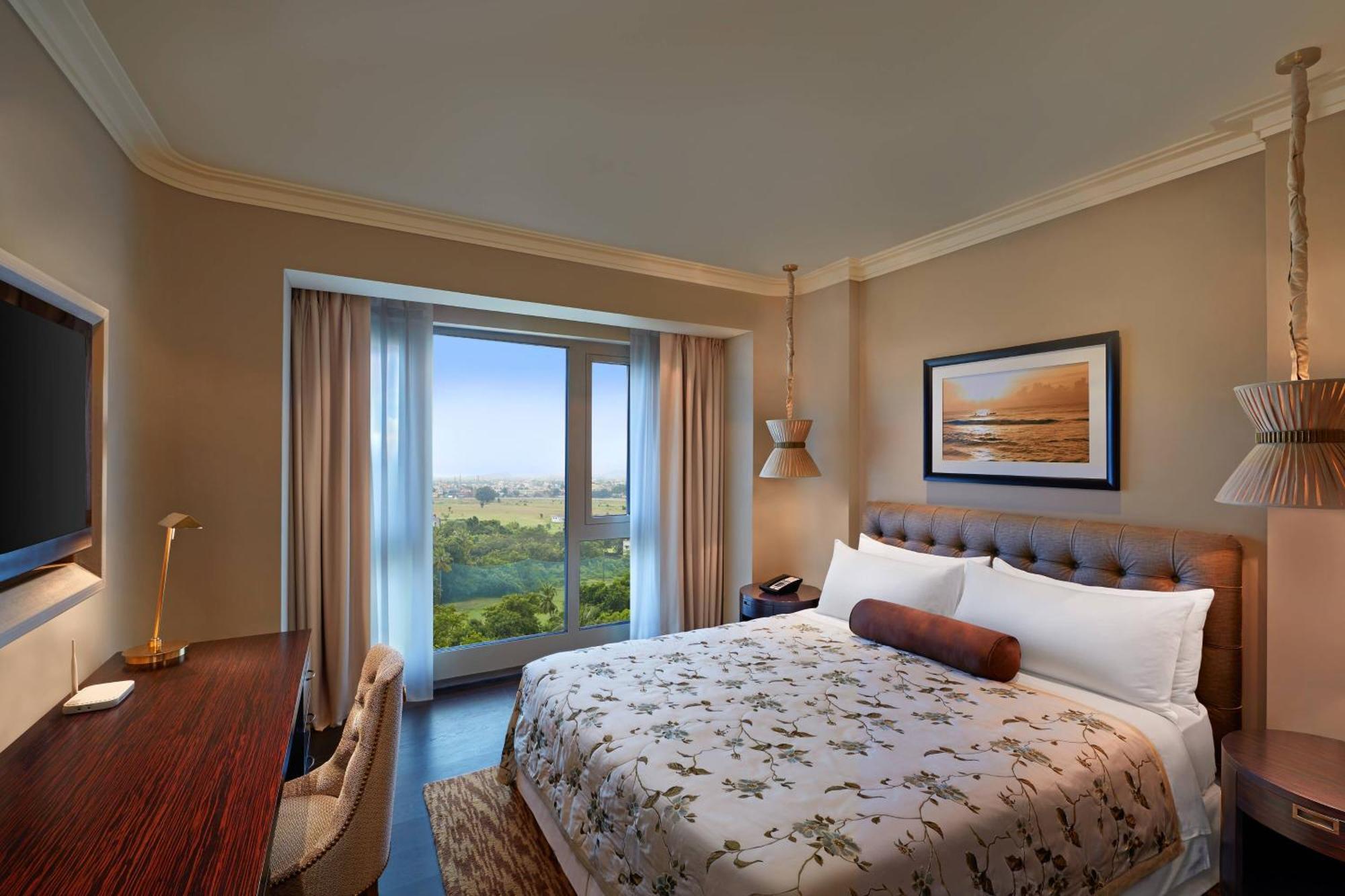 فندق آي تي سي جراند تشولا، أحد فنادق لاكشري كولكشن، تشيناي المظهر الخارجي الصورة A bedroom at the Ritz-Carlton, Laguna Niguel