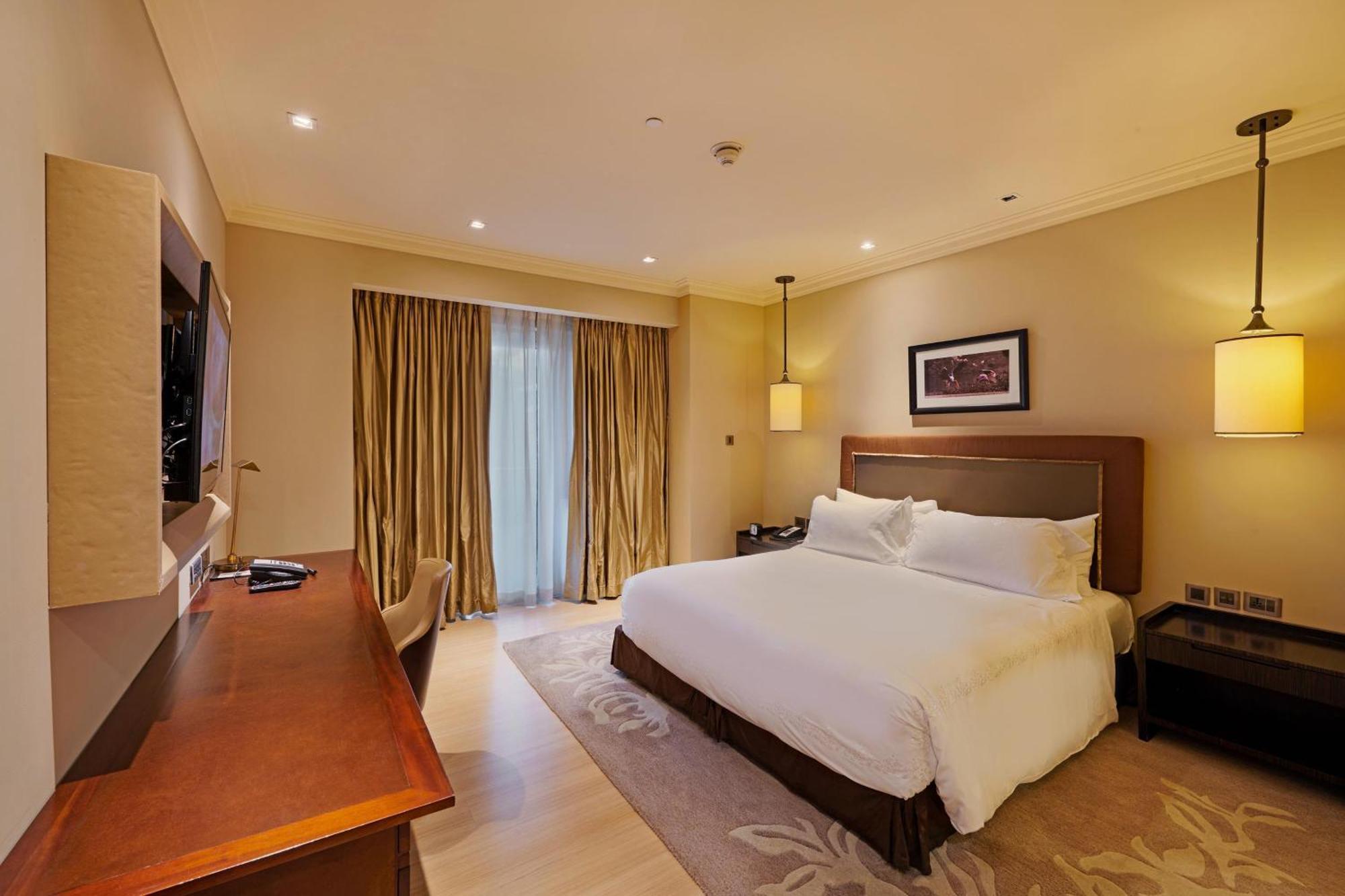 فندق آي تي سي جراند تشولا، أحد فنادق لاكشري كولكشن، تشيناي المظهر الخارجي الصورة A bedroom at the Taj Bengal