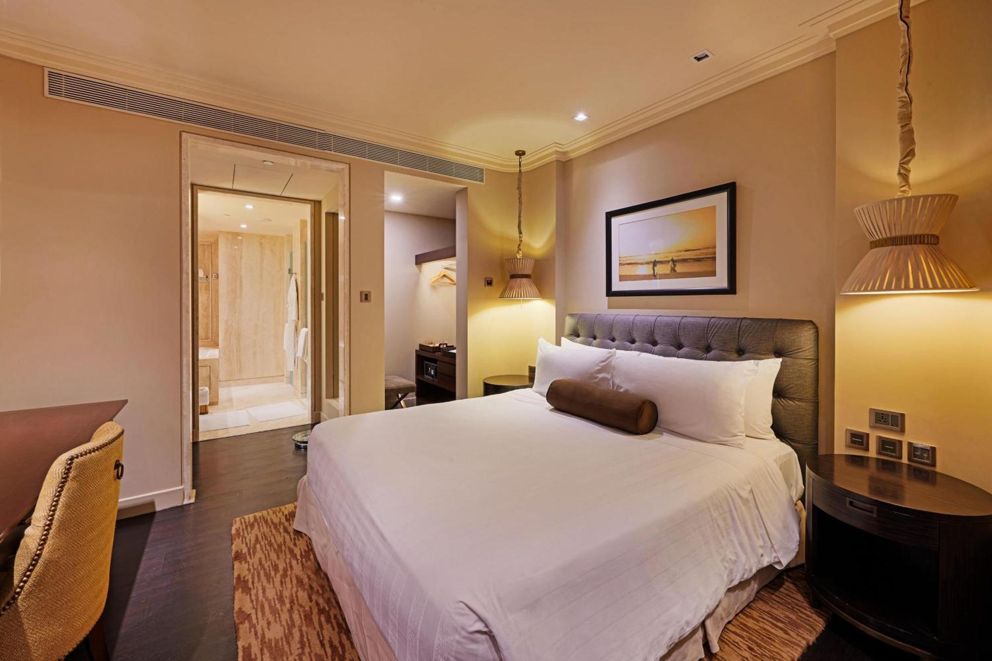 فندق آي تي سي جراند تشولا، أحد فنادق لاكشري كولكشن، تشيناي المظهر الخارجي الصورة A bedroom at the hotel